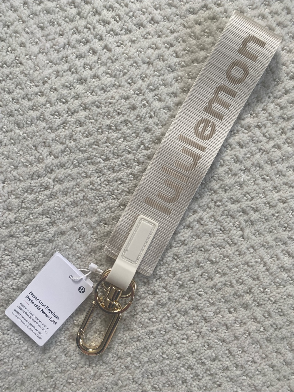 lululemon Never Lost Keychain Cream Logo with Gold Hardware